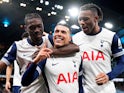 Tottenham Hotspur's Pedro Porro celebrates scoring with Yves Bissouma and Destiny Udogie on November 23, 2024