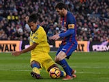 Lionel Messi of Barcelona and Mauricio Lemos of Las Palmas on January 14, 2017