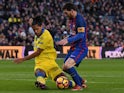 Lionel Messi of Barcelona and Mauricio Lemos of Las Palmas on January 14, 2017