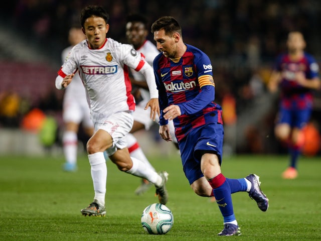 Lionel Messi of Barcelona and Takefusa Kubo of Mallorca on December 7, 2019