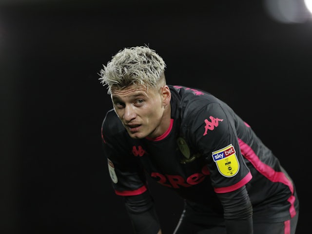 Ezgjan Alioski in a Leeds United shirt in 2019.