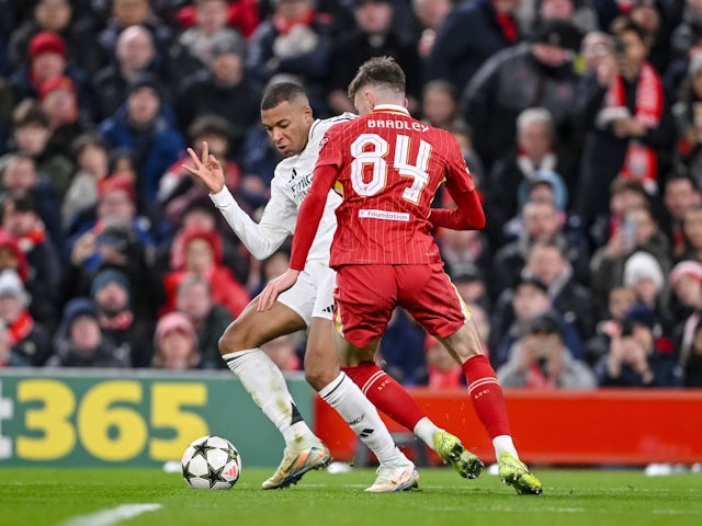 Liverpool's Conor Bradley in action with Real Madrid's Kylian Mbappe on November 27, 2024