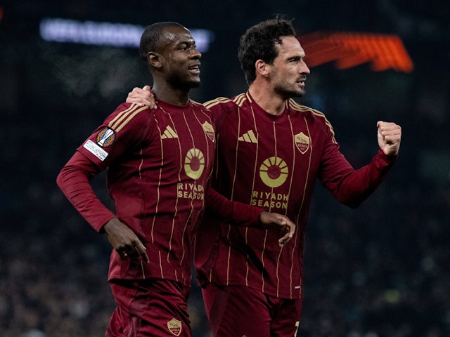 Mats Hummels and Evan Ndicka of Roma celebrate scoring on November 28, 2024