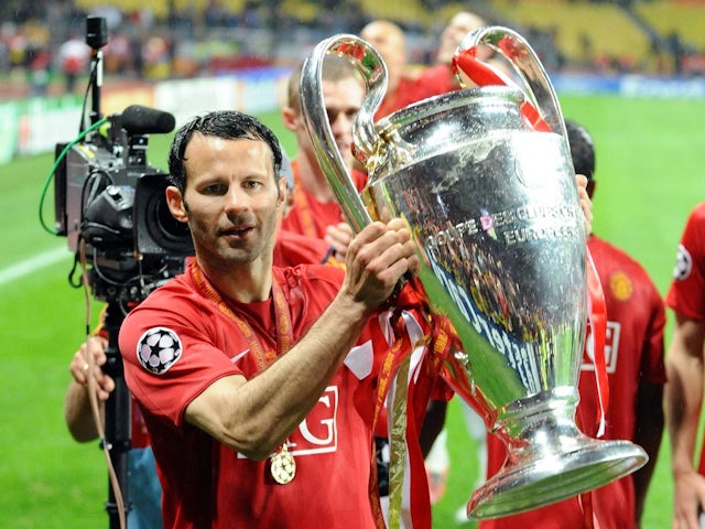 Ryan Giggs celebrates with the Champions League trophy in 2008