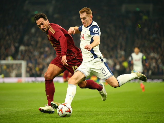 Tottenham Hotspur's Dejan Kulusevski and Roma's Mats Hummels on November 28, 2024