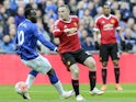 Wayne Rooney of Manchester United and Romelu Lukaku of Everton in action on April 23, 2016