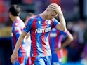 Crystal Palace's Adam Wharton looks dejected on August 24, 2024