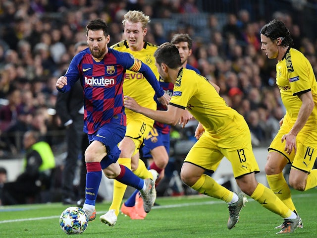 Barcelona's Lionel Messi and Borussia Dortmund's Raphael Guerreiro and Julian Brandt on November 27, 2019