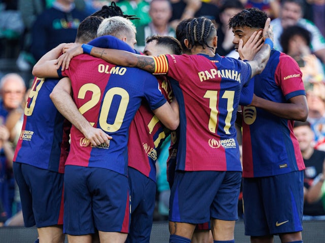 Barcelona players celebrate Robert Lewandowski's goal against Real Betis on December 7, 2024