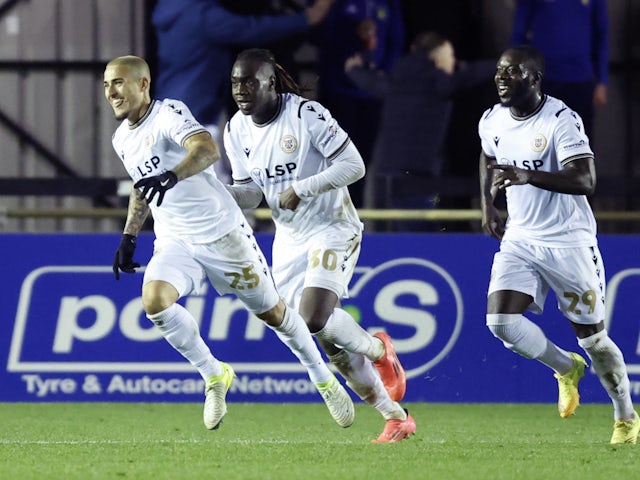 Bromley celebrate scoring a goal against Solihull Moors on December 1, 2024.