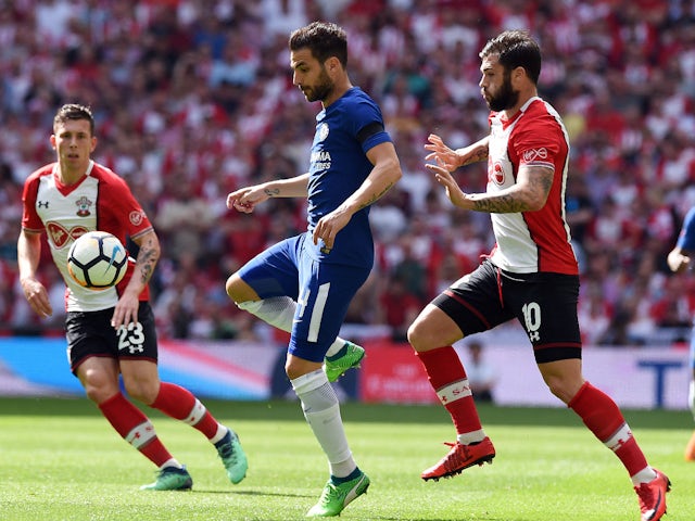 Chelsea's Cesc Fabregas and Southampton pair Pierre-Emile Hojbjerg and Charlie Austin on April 22, 2018