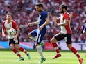 Chelsea's Cesc Fabregas and Southampton pair Pierre-Emile Hojbjerg and Charlie Austin on April 22, 2018