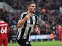 Newcastle United's Fabian Schar celebrates after scoring on December 4, 2024