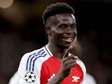 Arsenal's Bukayo Saka celebrates scoring on December 11, 2024