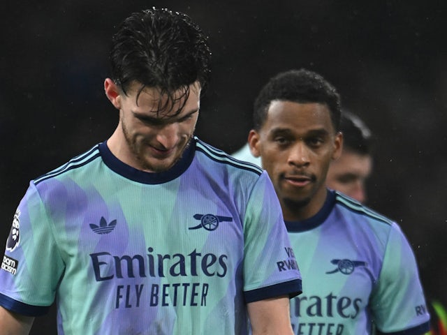 Arsenal's Jurrien Timber and Declan Rice look dejected on December 8, 2024