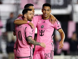 Inter Miami's Diego Gomez celebrates with teammates Lionel Messi and Luis Suarez on February 21, 2024