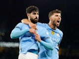 Manchester City's Josko Gvardiol celebrates scoring with Ruben Dias on December 15, 2024