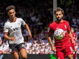 Liverpool's Mohamed Salah against Fulham's Antonee Robinson on August 6, 2022