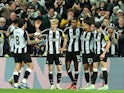 Newcastle United players celebrate on December 14, 2024