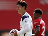 Tottenham Hotspur's Son Heung-min with the match ball after scoring a hat-trick against Southampton on September 20, 2020