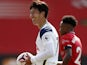 Tottenham Hotspur's Son Heung-min with the match ball after scoring a hat-trick against Southampton on September 20, 2020