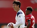 Tottenham Hotspur's Son Heung-min with the match ball after scoring a hat-trick against Southampton on September 20, 2020