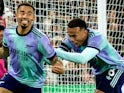 Arsenal's Gabriel Jesus and Gabriel Magalhaes celebrate on December 21, 2024