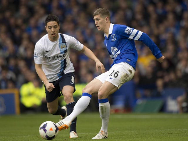 Everton's John Stones and Manchester City's Samir Nasri on May 3, 2014