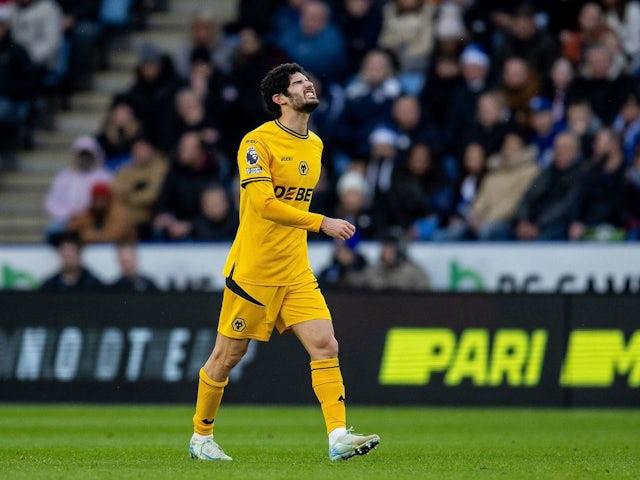 Wolverhampton Wanderers midfielder Goncalo Guedes scores and limps during his side's Premier League match against Leicester City, on December 22, 2024