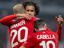 Lille's Ayyoub Bouaddi celebrates with Remy Cabella and Mitchel Bakker on December 11, 2024