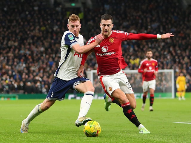 Dejan Kulusevski of Tottenham Hotspur and Diogo Dalot of Manchester United on December 19, 2024 