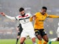 Manchester United's Bruno Fernandes (left) and Wolverhampton Wanderers' Nelson Semedo battle for the ball during their side's clash, on December 26, 2024