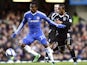 Chelsea's Salomon Kalou and Ipswich Town's Jaime Peters on January 9, 2011