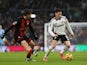 Harry Wilson of Fulham defended by Illya Zabarnyi of Bournemouth during their side's clash, on December 29, 2024