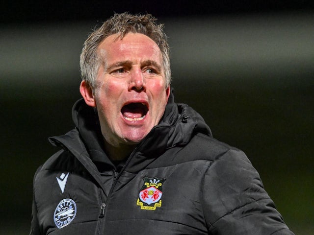 Wrexham manager Phil Parkinson thanks fans after his side's match against Burton Albion, on December 7, 2024