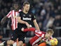 West Ham United's Tomas Soucek (left) and Southampton's Flynn Downes battle for the ball during their side's clash, on December 26, 2024