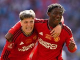 Manchester United's Alejandro Garnacho and Kobbie Mainoo celebrate on May 25, 2024