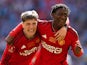 Manchester United's Alejandro Garnacho and Kobbie Mainoo celebrate on May 25, 2024