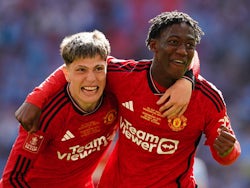 Manchester United's Alejandro Garnacho and Kobbie Mainoo celebrate on May 25, 2024