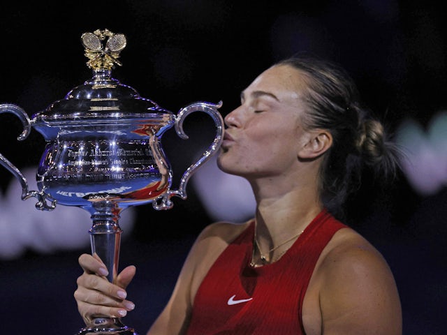 Aryna Sabalenka poses with the trophy after winning the Australian Open on January 27, 2024