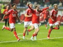 Benfica players celebrate after beating Sporting Lisbon on penalties in the Taca da Liga final on January 11, 2024