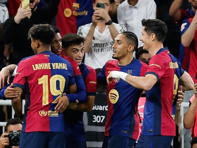 Barcelona players celebrate a goal against Real Madrid on January 12, 2025