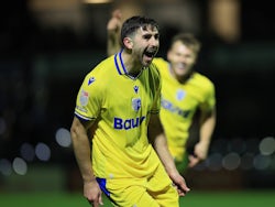 Gillingham defender Robbie McKenzie celebrates his goal against Bromley on December 4, 2024