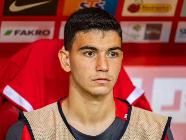 Poland and Kasimpasa's Yasin Ozcan pictured connected  June 10, 2024