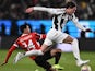 Dusan Vlahovic (Juventus) and Tijjani Reijnders (AC Milan) vie for the ball on January 3, 2025