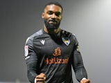  Mandela Egbo of Colchester United celebrates with fans on January 18, 2025