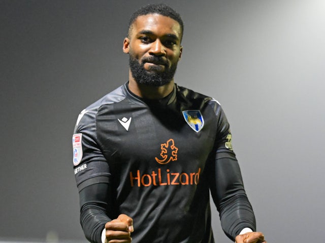  Mandela Egbo of Colchester United celebrates with fans on January 18, 2025