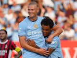 Manchester City's Erling Haaland and Oscar Bobb celebrate on July 27, 2024