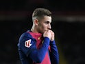 Barcelona's Fermin Lopez kisses the badge against Valencia on January 26, 2025