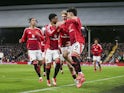 Manchester United players celebrate Lisandro Martinez's goal against Fulham on January 26, 2025